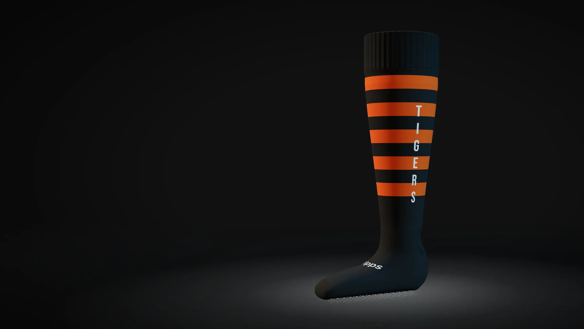 A black iGripps football sock with an orange hoop, full length and uncut